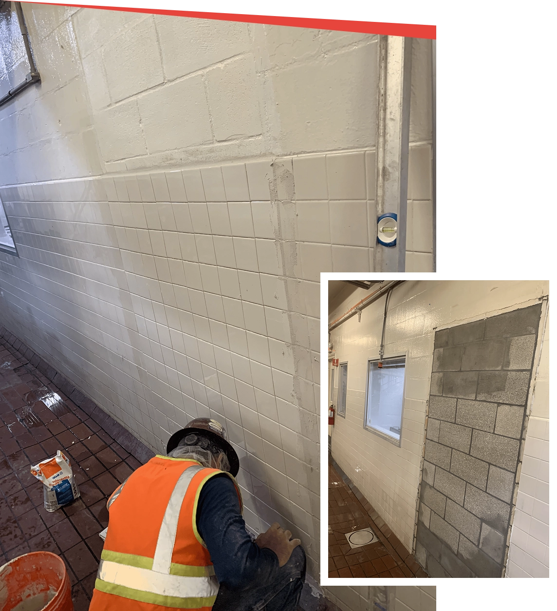 Worker tiling wall in construction area.